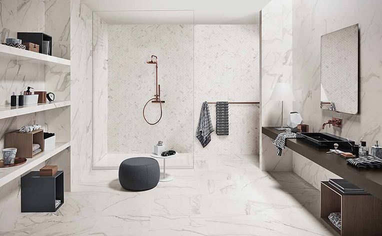 Large white marble bathroom with large shower